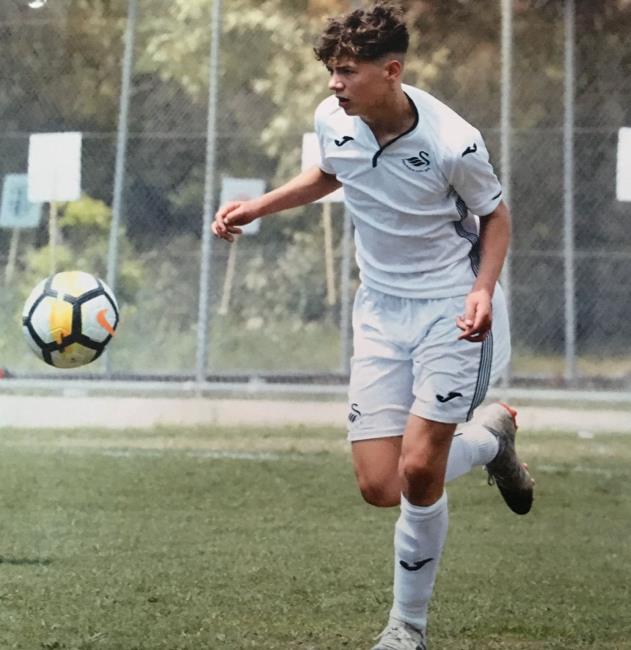 Jacob playing for Swansea City in his younger days